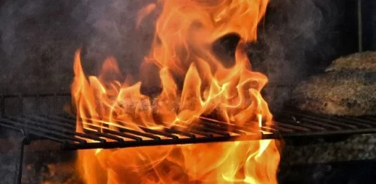 How to Prevent Flare-Ups When Grilling Thick Steaks on a Charcoal BBQ