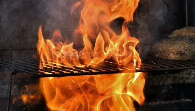 How to Prevent Flare-Ups When Grilling Thick Steaks on a Charcoal BBQ