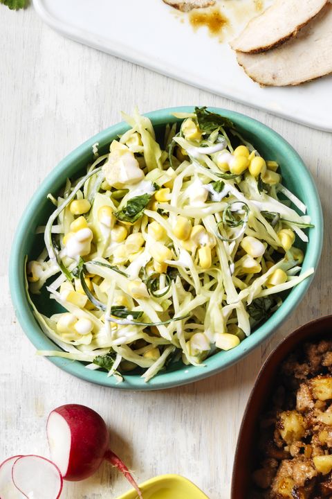 cabbage slaw tossed with corn and a creamy dressing