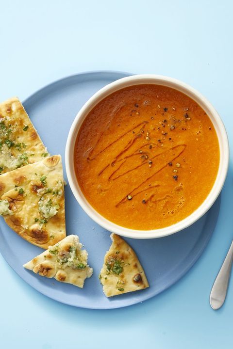 spiced fresh tomato soup with sweet and herby pitas
